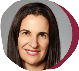 portrait of a woman with long dark hair and a friendly smile, professional headshot with a soft background and rounded edges