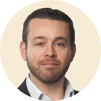 professional man with beard in circular frame, business portrait with neutral background