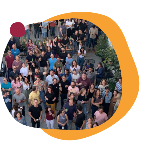crowd of people gathered outdoors for an event, diverse group enjoying a social gathering in an urban setting