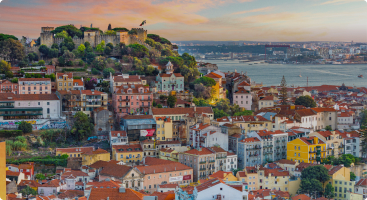 lisbon-sunset-view, historic-castle-and-colorful-buildings