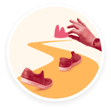shoes_on_path, hand_placing_heart