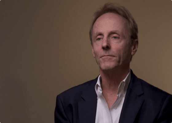 man in formal attire, neutral background